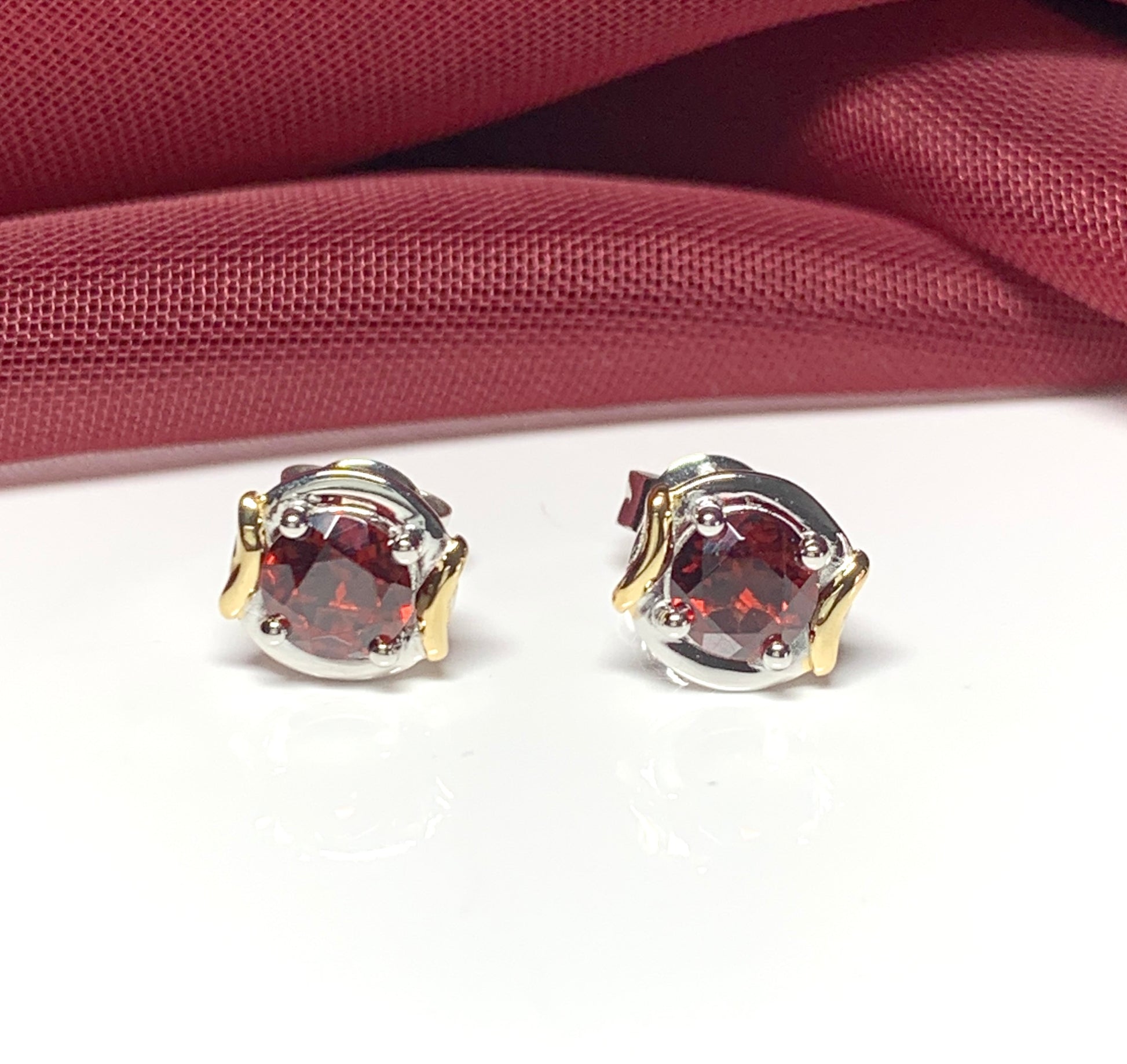 Garnet two tone sterling silver and silver gilt round stud earrings