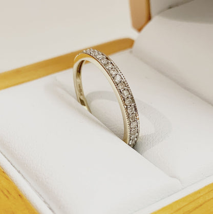 Yellow gold quarter carat diamond eternity ring grain set 25 points