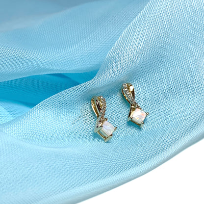 Gold opal and diamond stud earrings