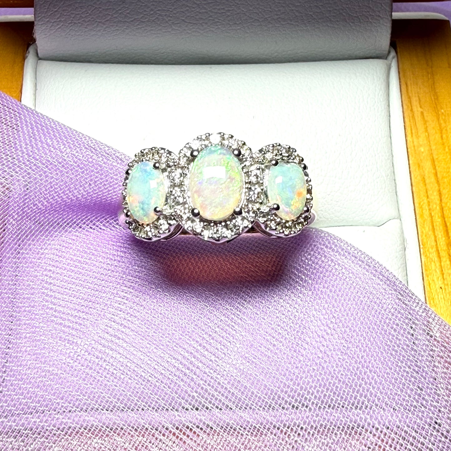 Gold oval cut three real opal and diamond trilogy cluster ring