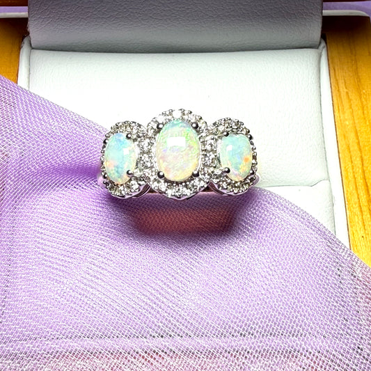 Gold oval cut three real opal and diamond trilogy cluster ring