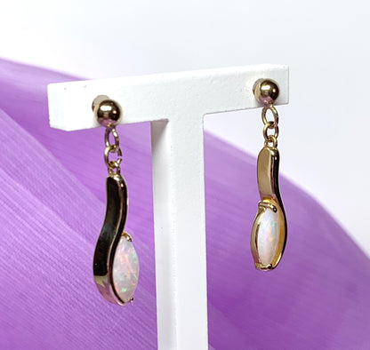 Yellow gold real opal marquise drop earrings