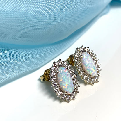 Gold oval opal and cubic zirconia earrings