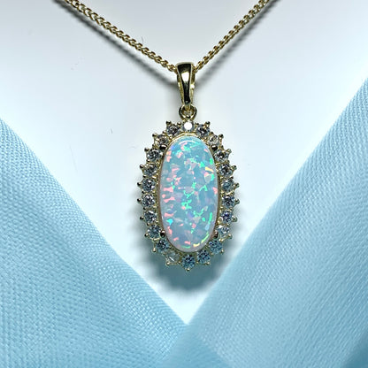 Gold oval opal and cubic zirconia necklace pendent