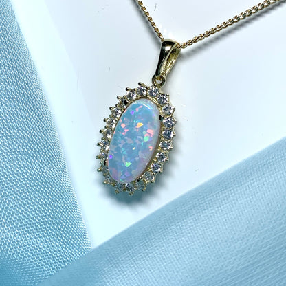 Gold oval opal and cubic zirconia necklace pendent