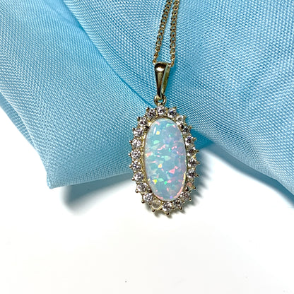 Gold oval opal and cubic zirconia necklace pendent