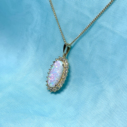 Gold oval opal and cubic zirconia necklace pendent