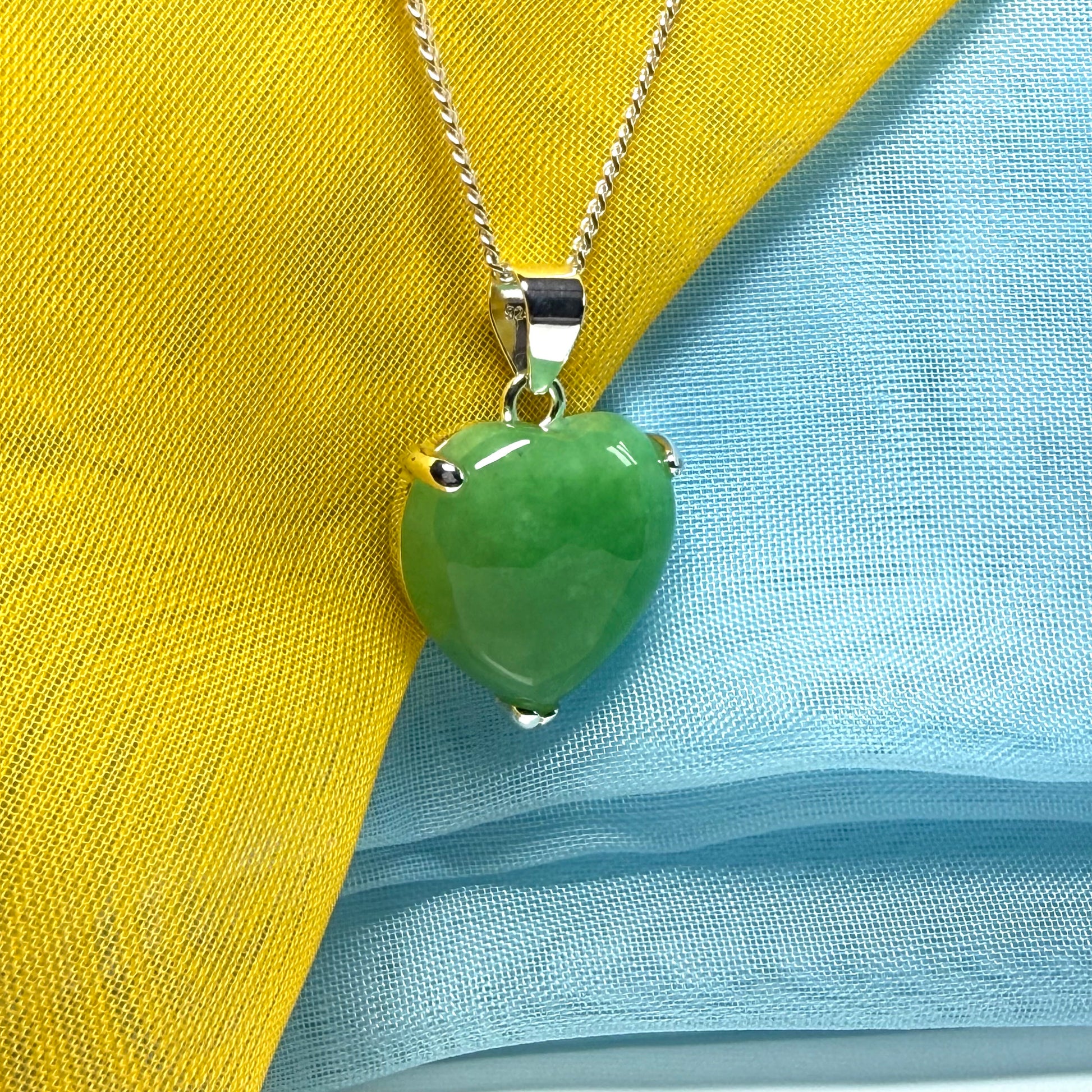 A gorgeous real green jade necklace heart shaped sterling silver, exquisitely designed pendant with chain