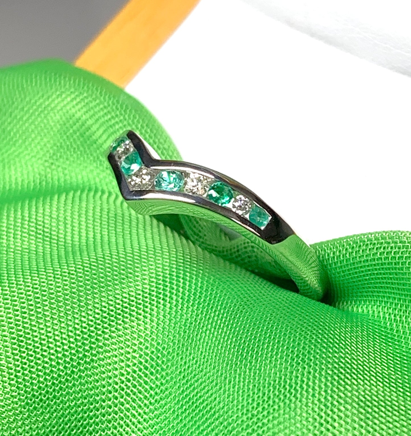 Green Emerald And Diamond White Gold Wishbone Ring Rubbed Smooth Over Setting