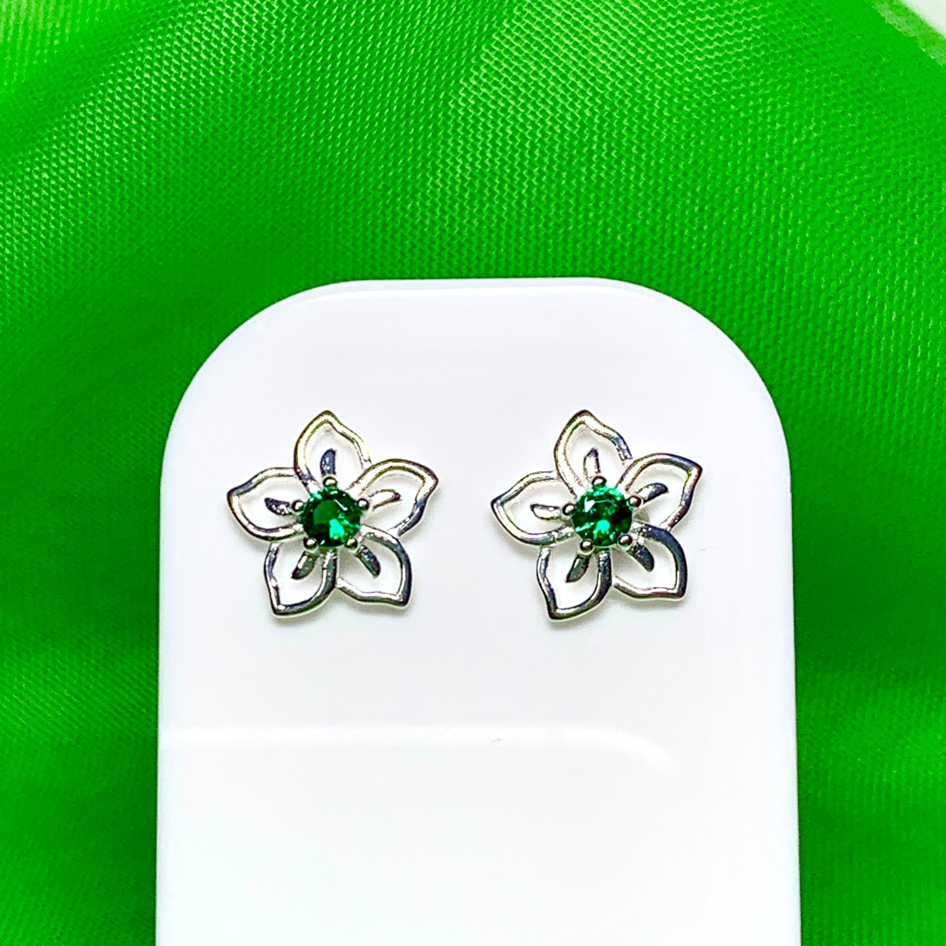 Green cubic zirconia flower shaped dress stud earrings