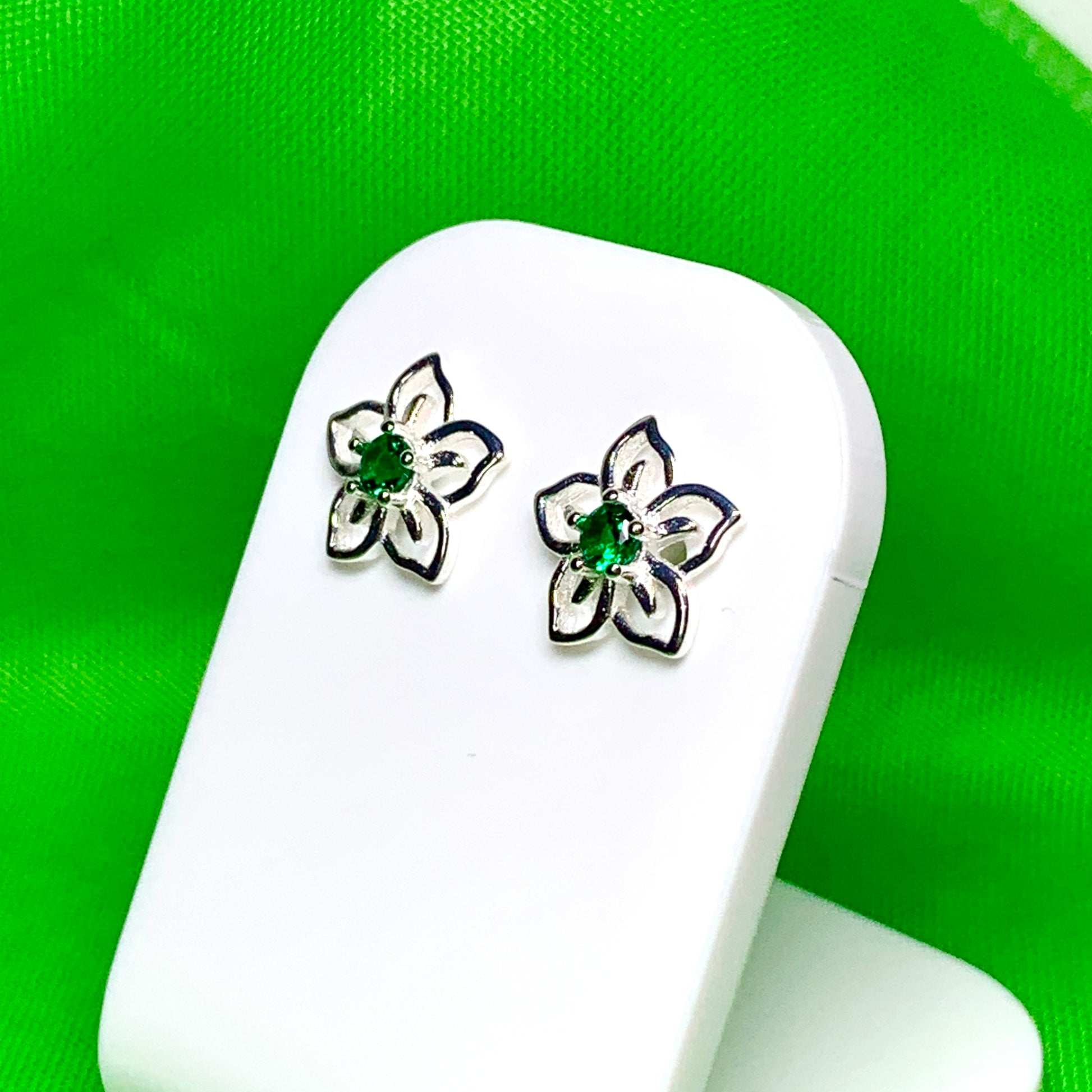 Green cubic zirconia flower shaped dress stud earrings