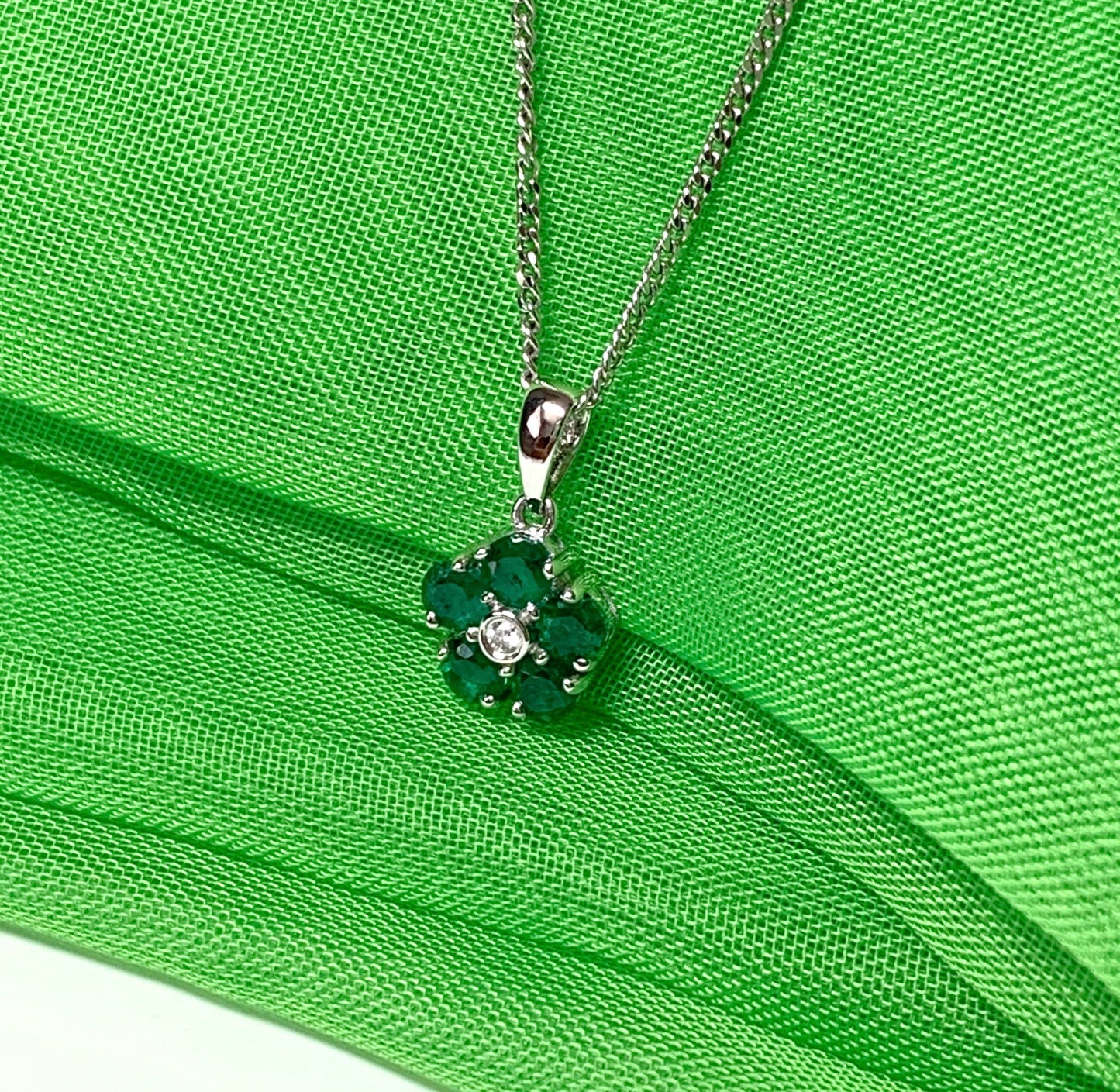 Green emerald and diamond white gold daisy cluster necklace