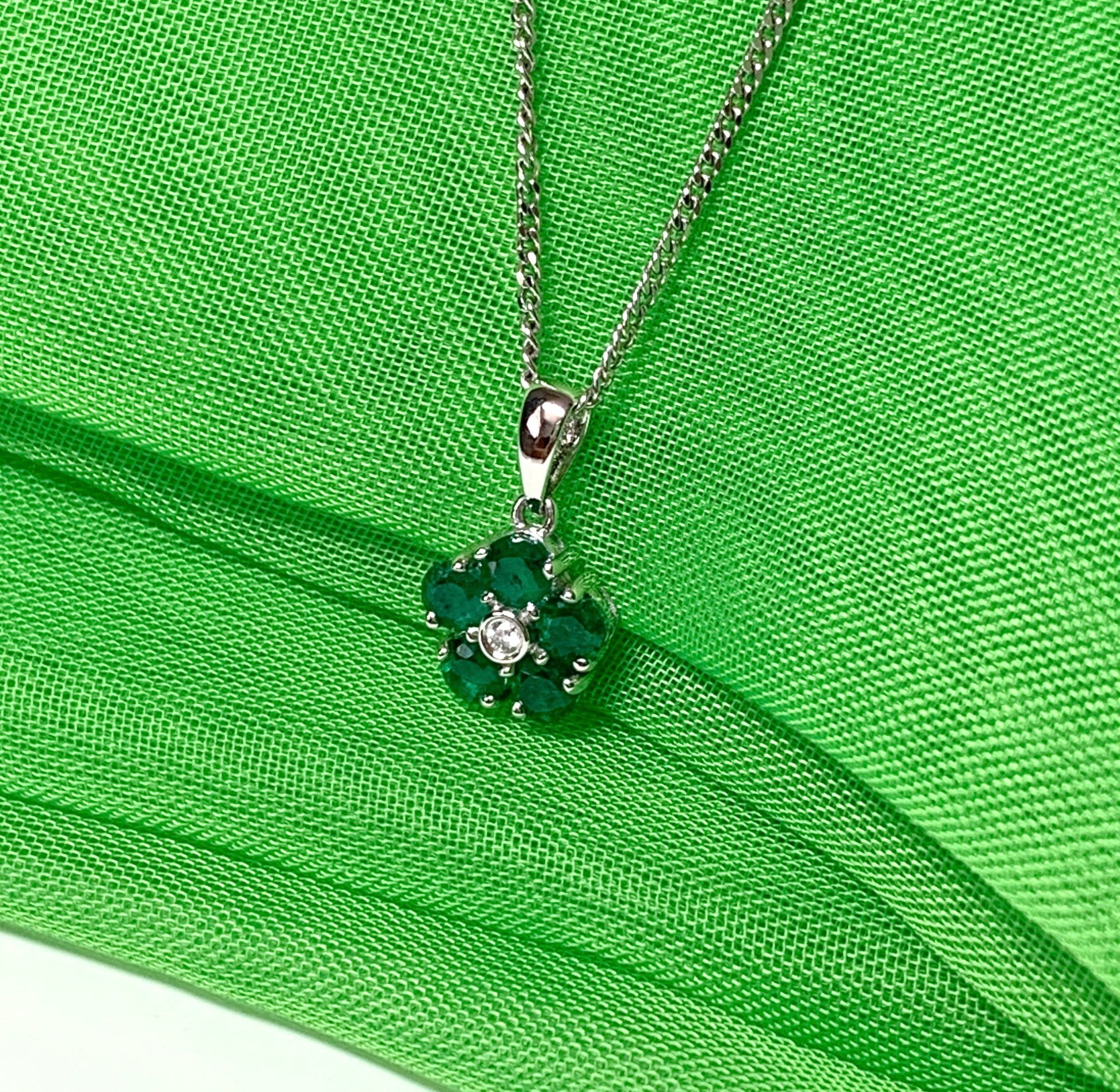 Green emerald and diamond white gold daisy cluster necklace