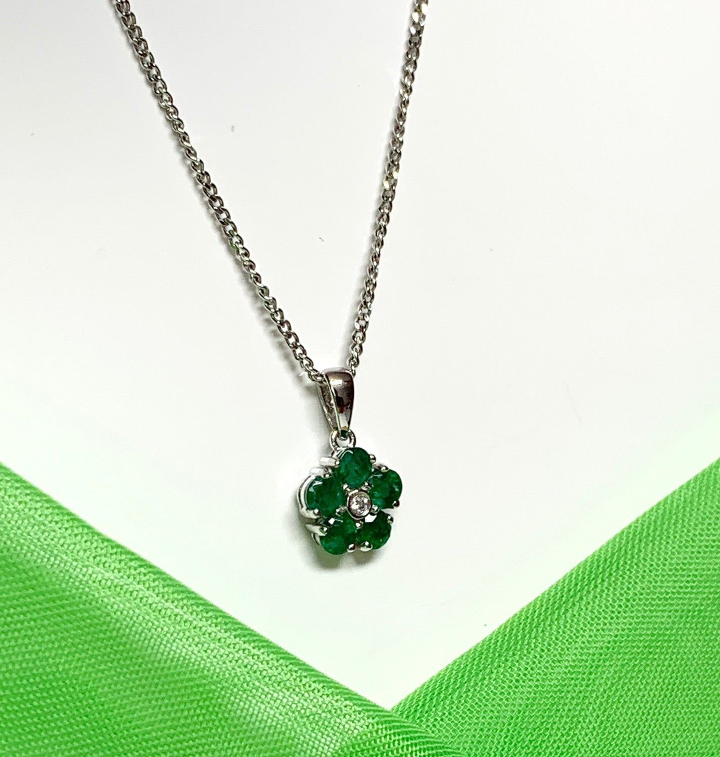 Green emerald and diamond white gold daisy cluster necklace
