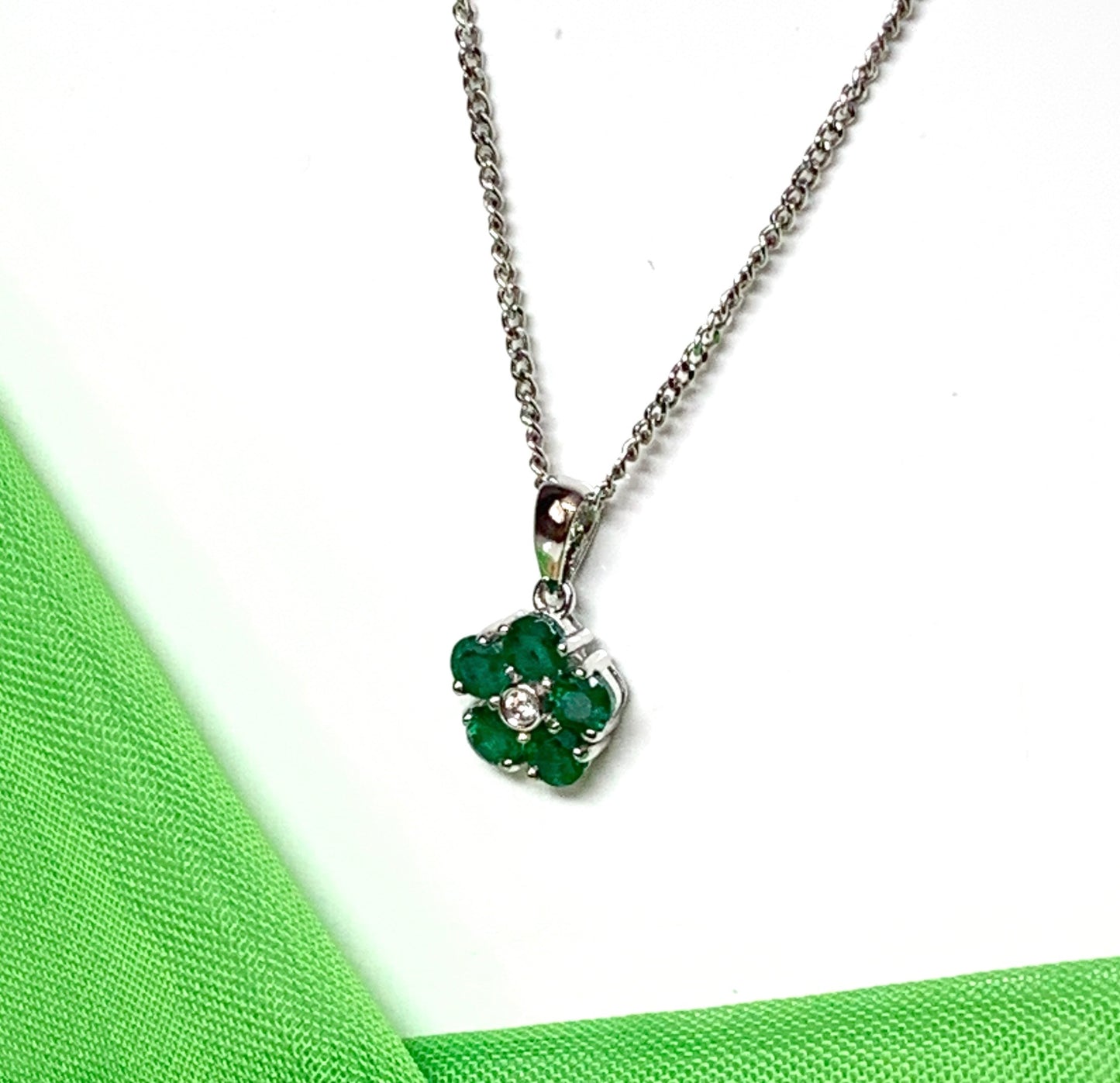 Green emerald and diamond white gold daisy cluster necklace