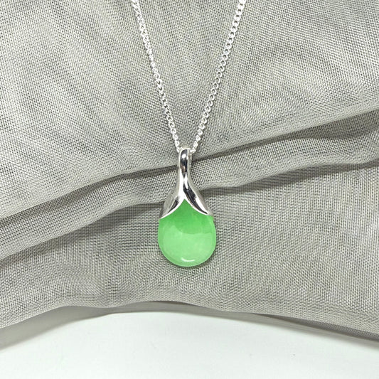 Green jade cushion shaped silver necklace pendant, a stunning design