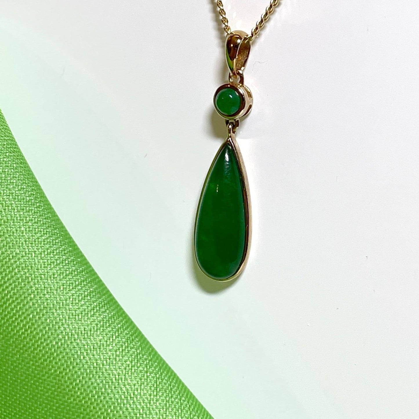 Green jade double yellow gold pear and round shaped necklace