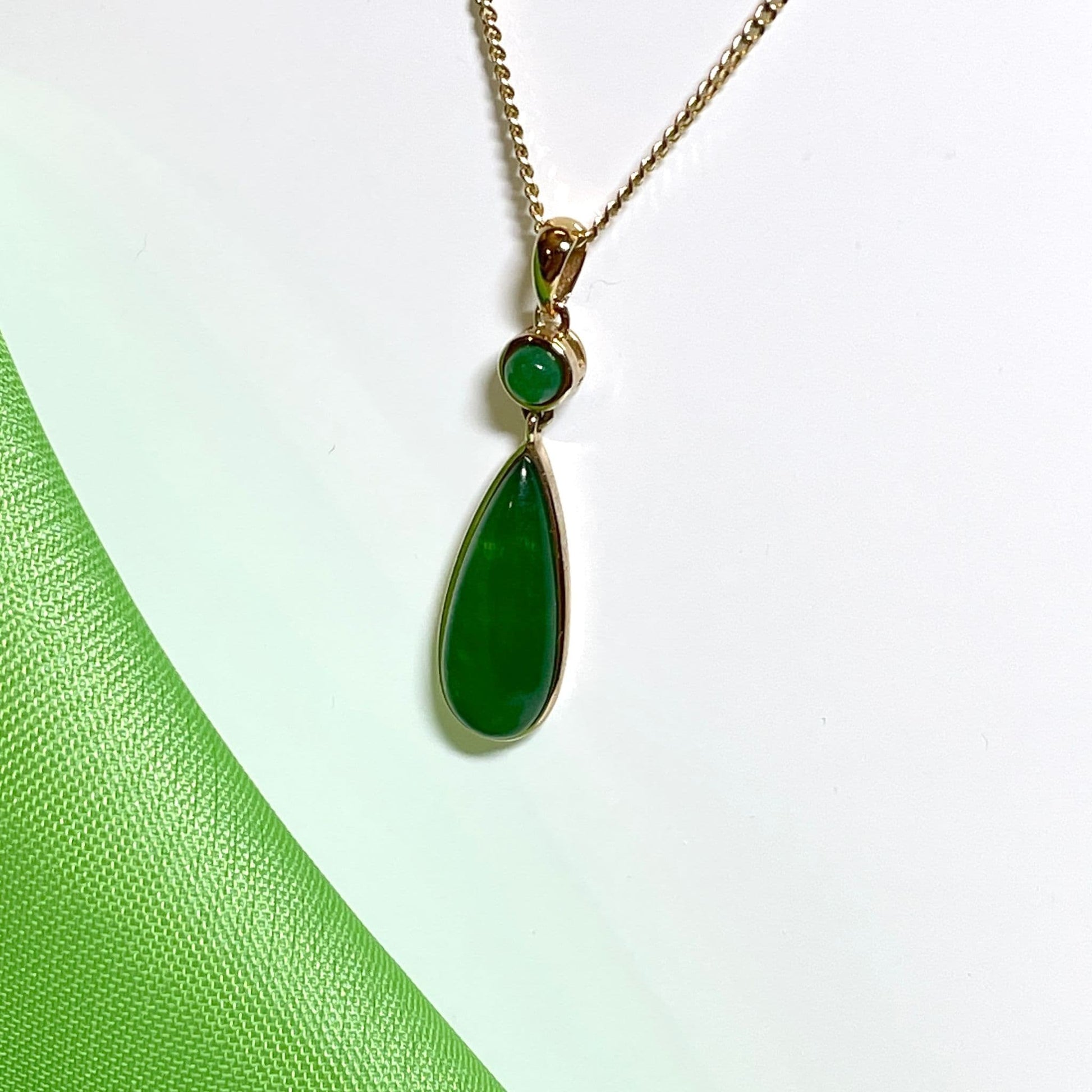 Green jade double yellow gold pear and round shaped necklace