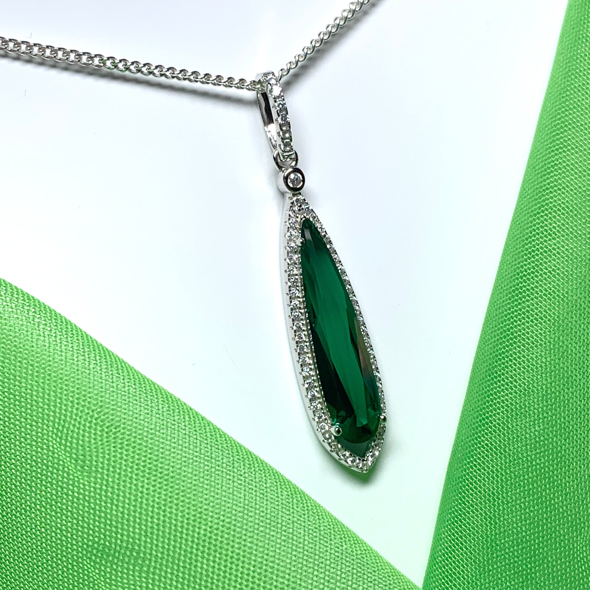 Green pear shaped cubic zirconia silver cluster long drop necklace pendant
