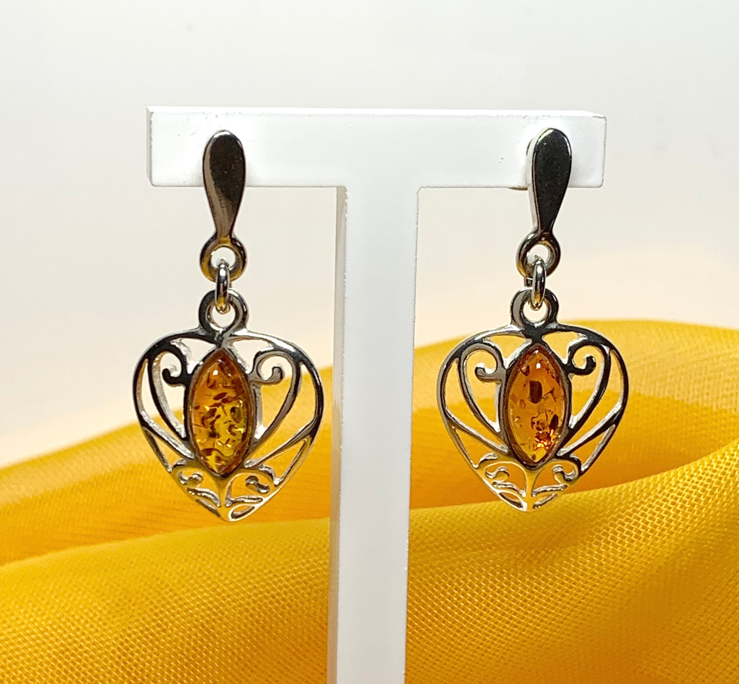 Heart shaped real amber drop earrings made in sterling silver