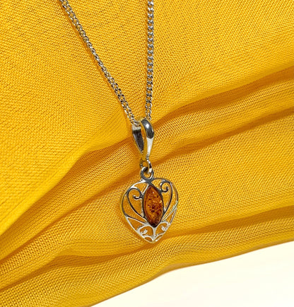 Heart shaped real amber necklace sterling silver pendant