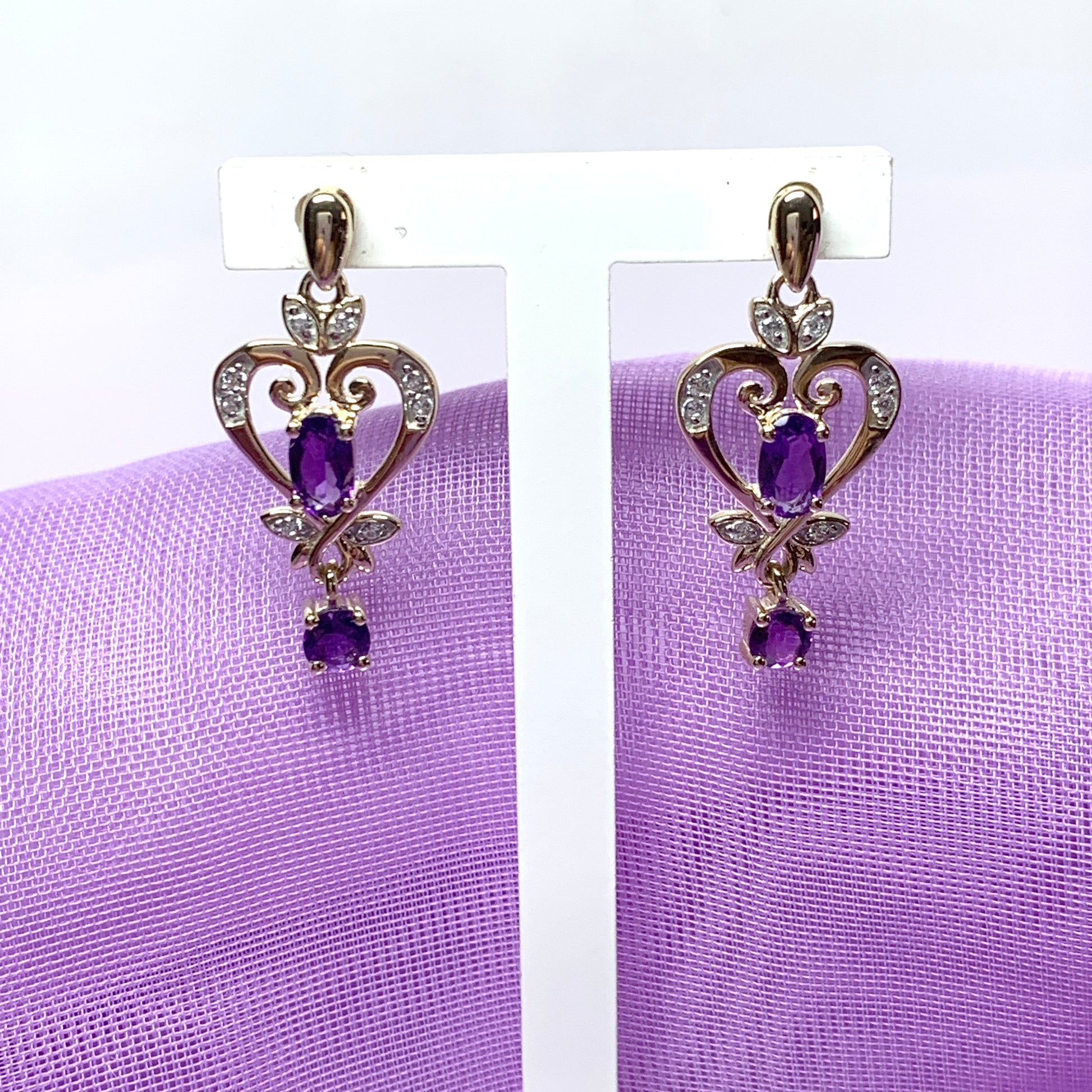 Heart shaped yellow gold and amethyst earrings
