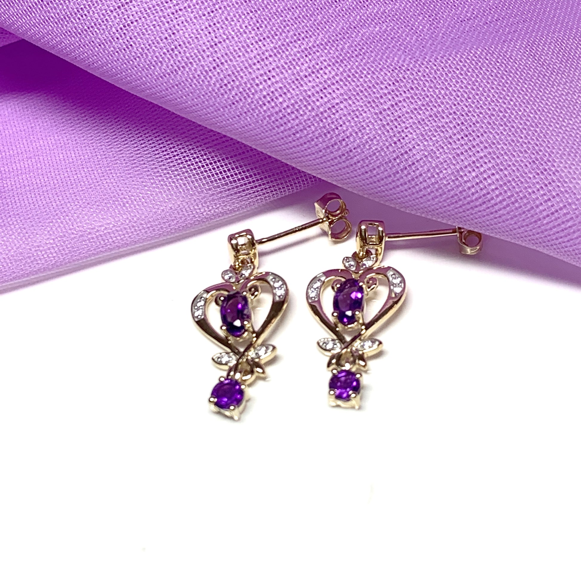 Heart shaped yellow gold and amethyst earrings