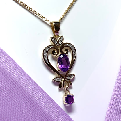 Heart shaped yellow gold and amethyst necklace pendent