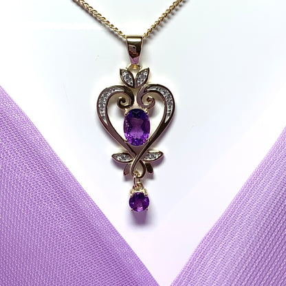 Heart shaped yellow gold and amethyst necklace pendent