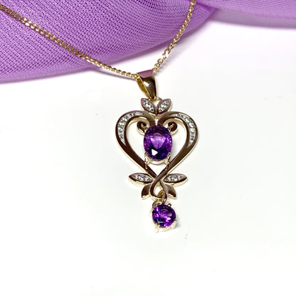 Heart shaped yellow gold and amethyst necklace pendent