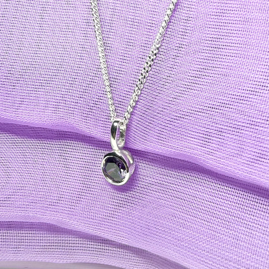 Real purple amethyst round sterling silver necklace with a smooth rubbed over pendant