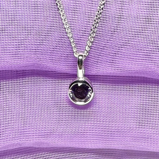 Real purple amethyst round sterling silver necklace with a smooth rubbed over pendant