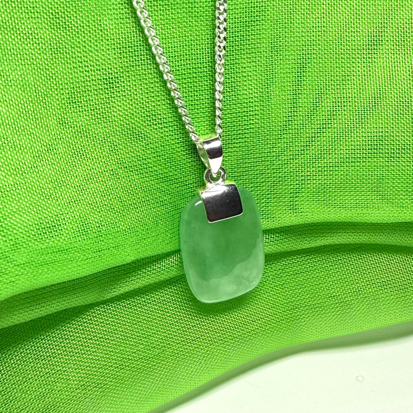 Real green jade necklace cushion shape stone sterling silver, a traditional designed pendant