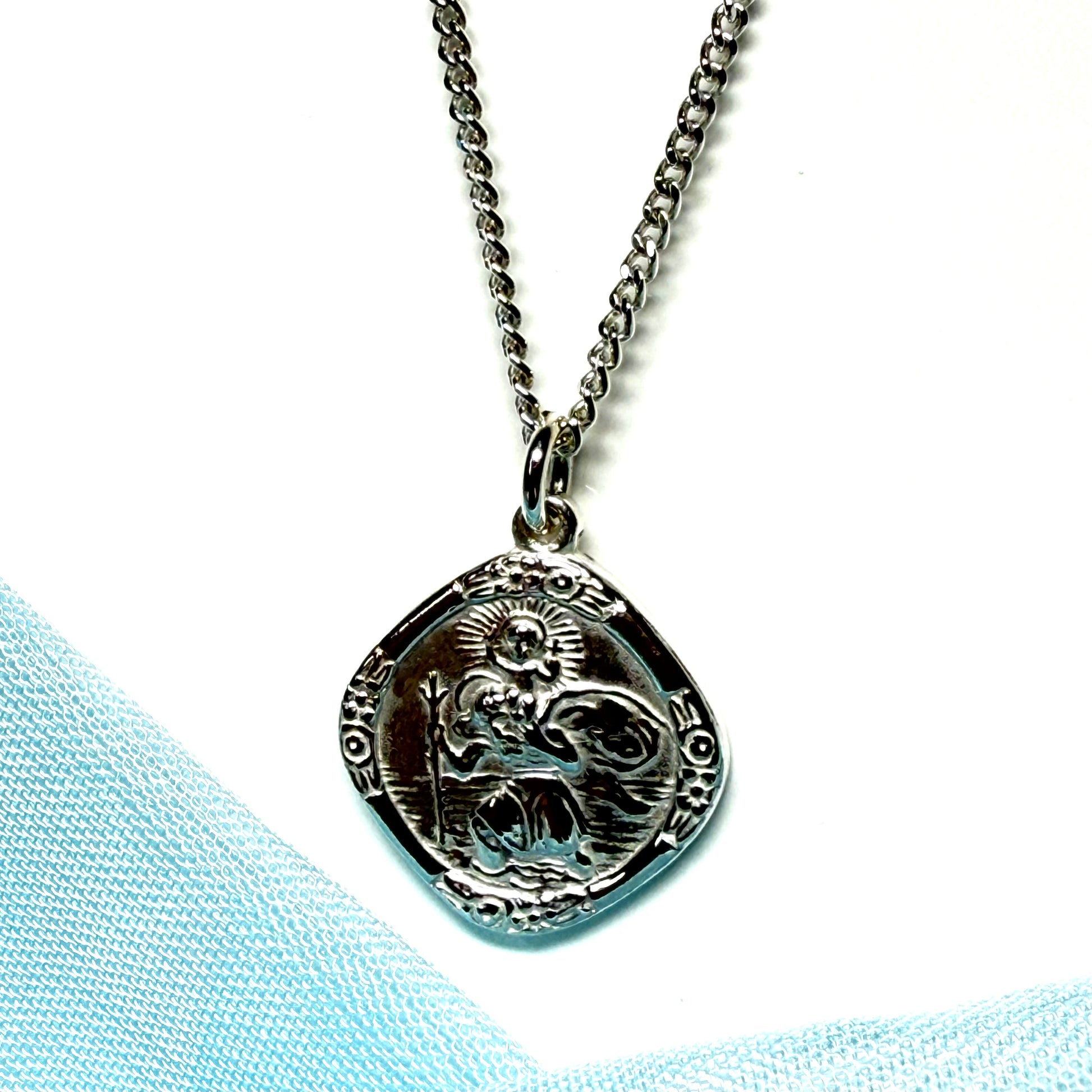 Sterling silver solid cushion shaped St. Christopher necklace double sided with a chain included