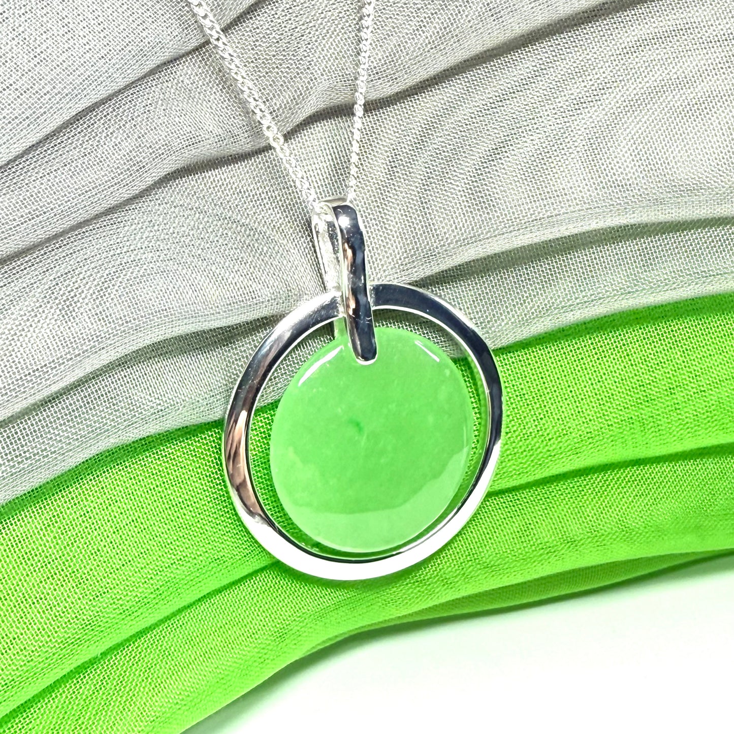 A large stunning sterling silver green real jade necklace halo style, a gorgeous designed round pendant
