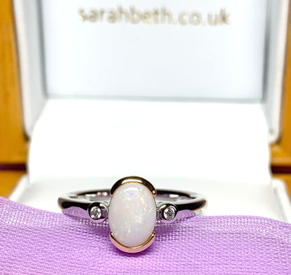 Sterling silver real opal oval and cubic zirconia ring