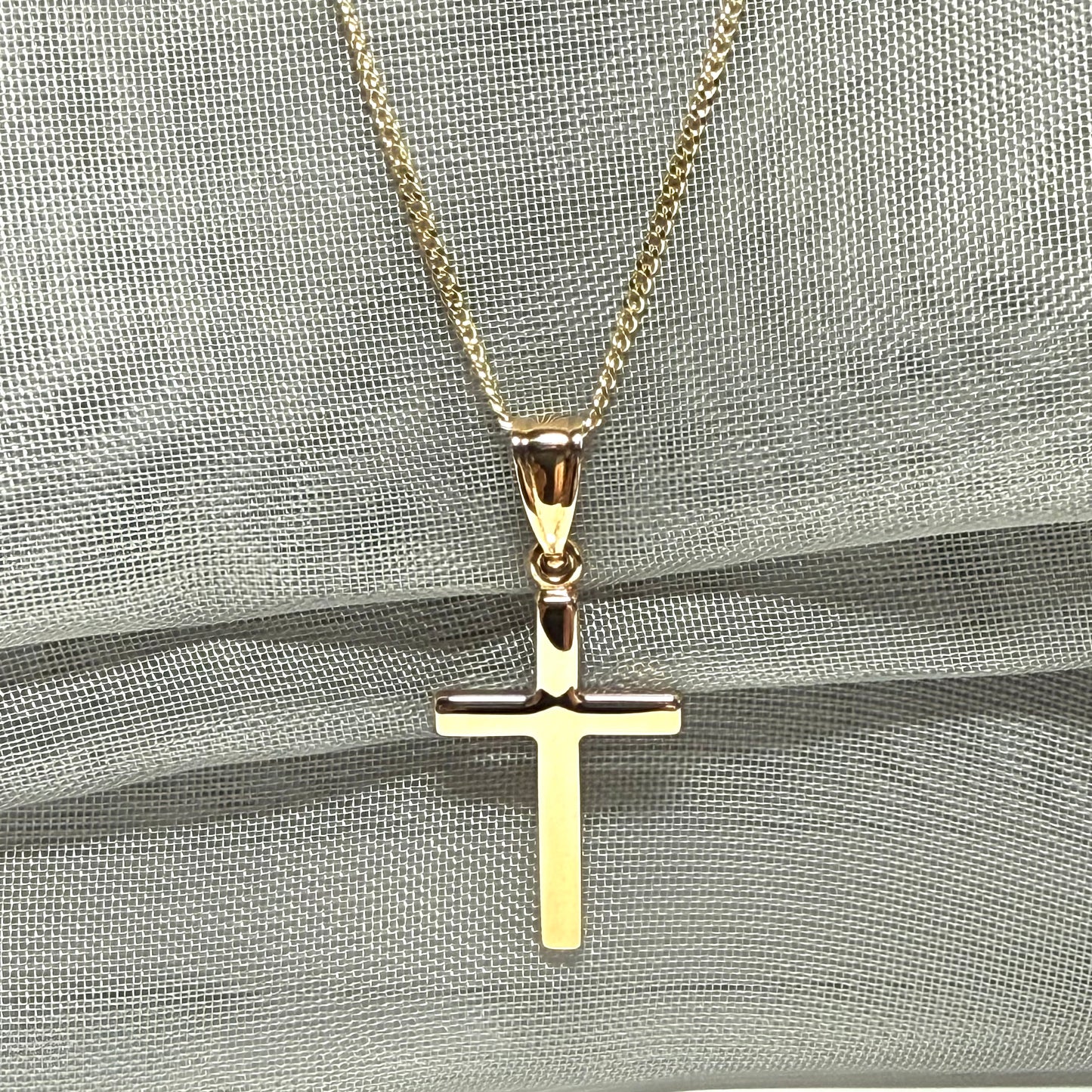 Polished plain polished yellow cross pendant