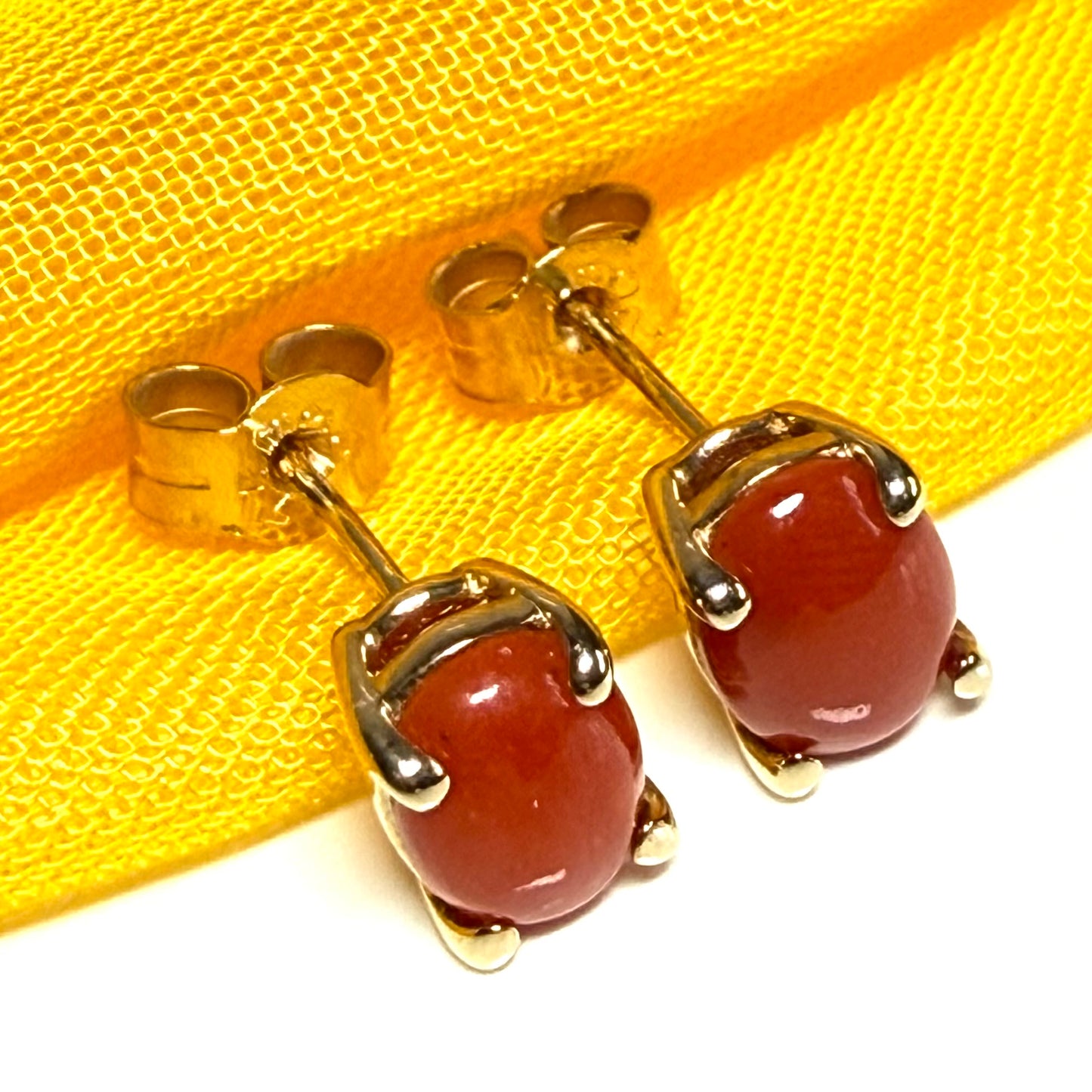 Real coral oval shaped stud earrings yellow gold