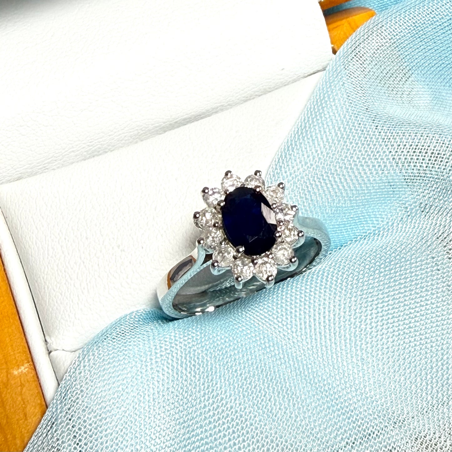 White gold real blue sapphire and diamond oval shaped cluster ring
