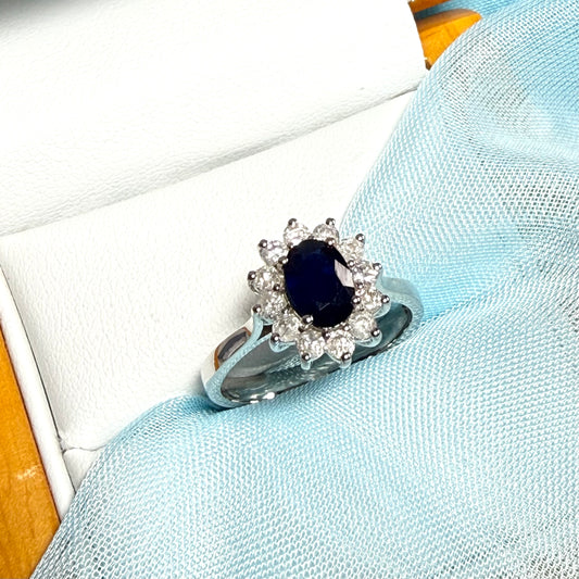 White gold real blue sapphire and diamond oval shaped cluster ring