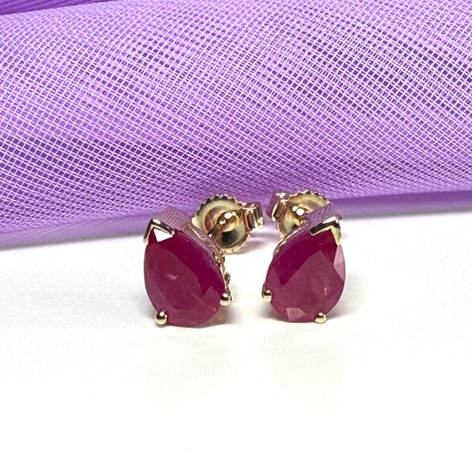 Real ruby yellow gold pear shaped stud earrings