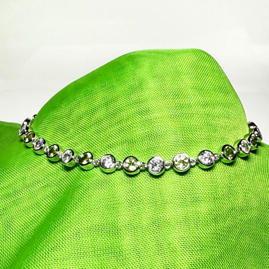 Green real peridot and cubic zirconia round sterling silver bracelet