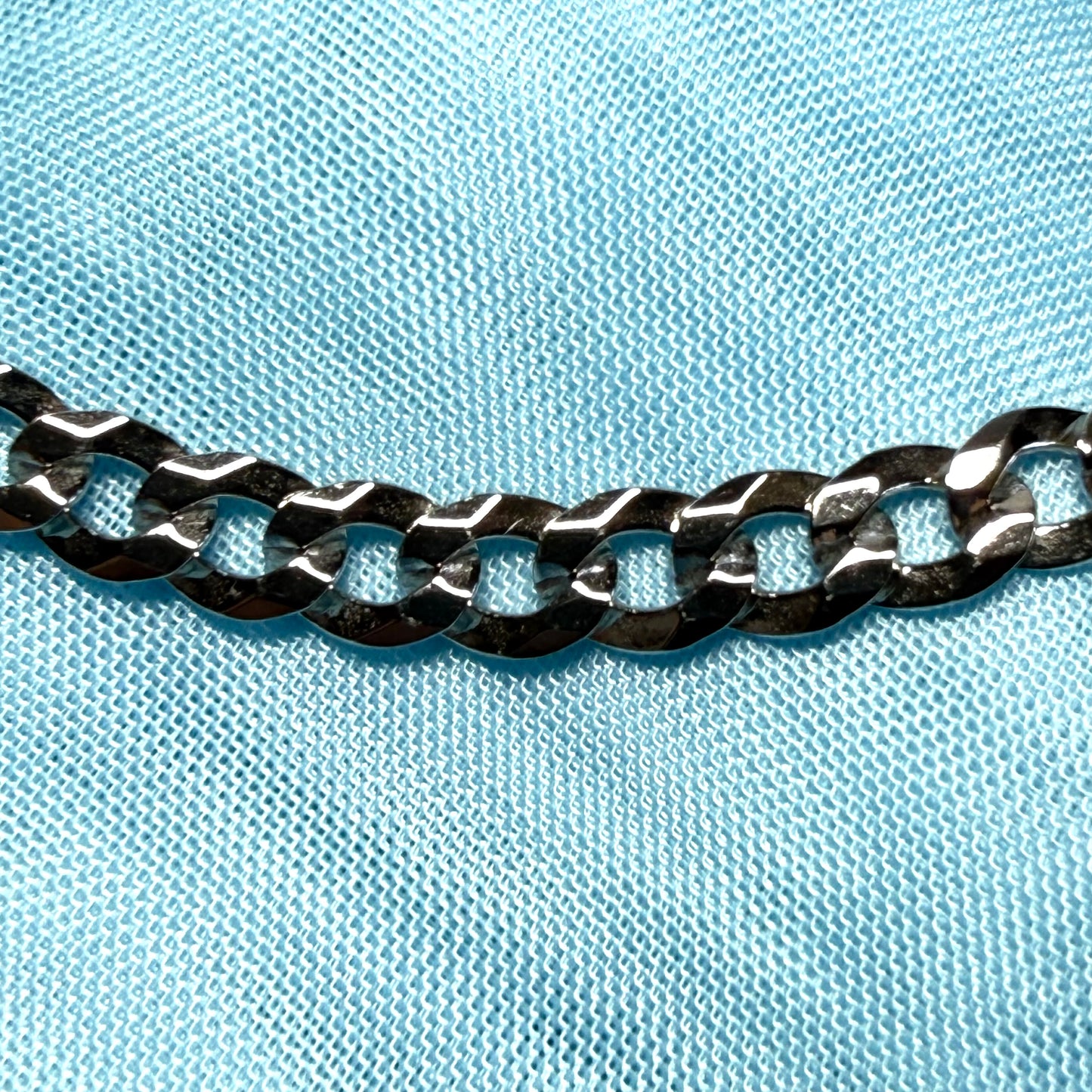 Men's solid sterling silver curb bracelet measuring 8.5 inches