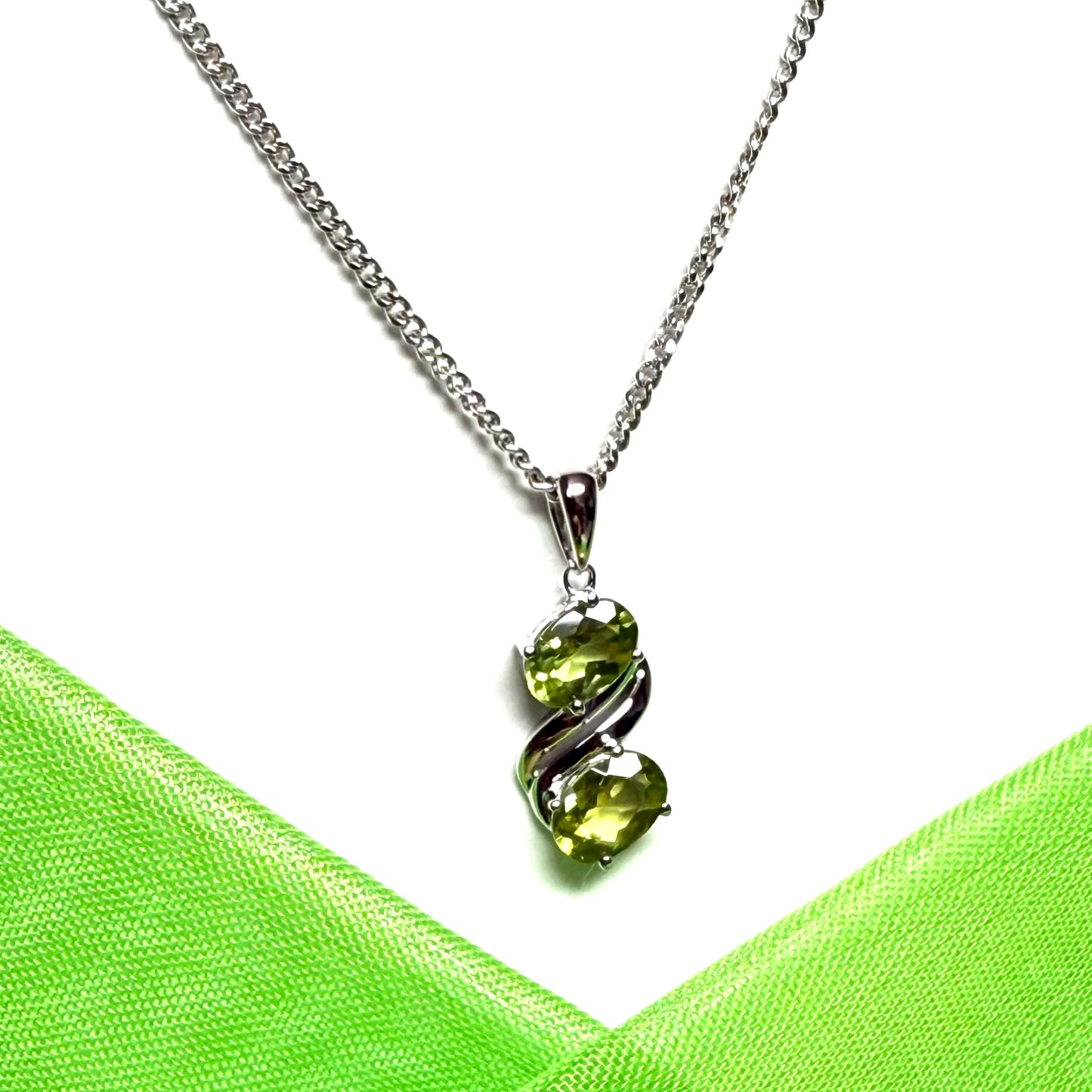 Real green peridot necklace fancy double swirl oval stones including a chain