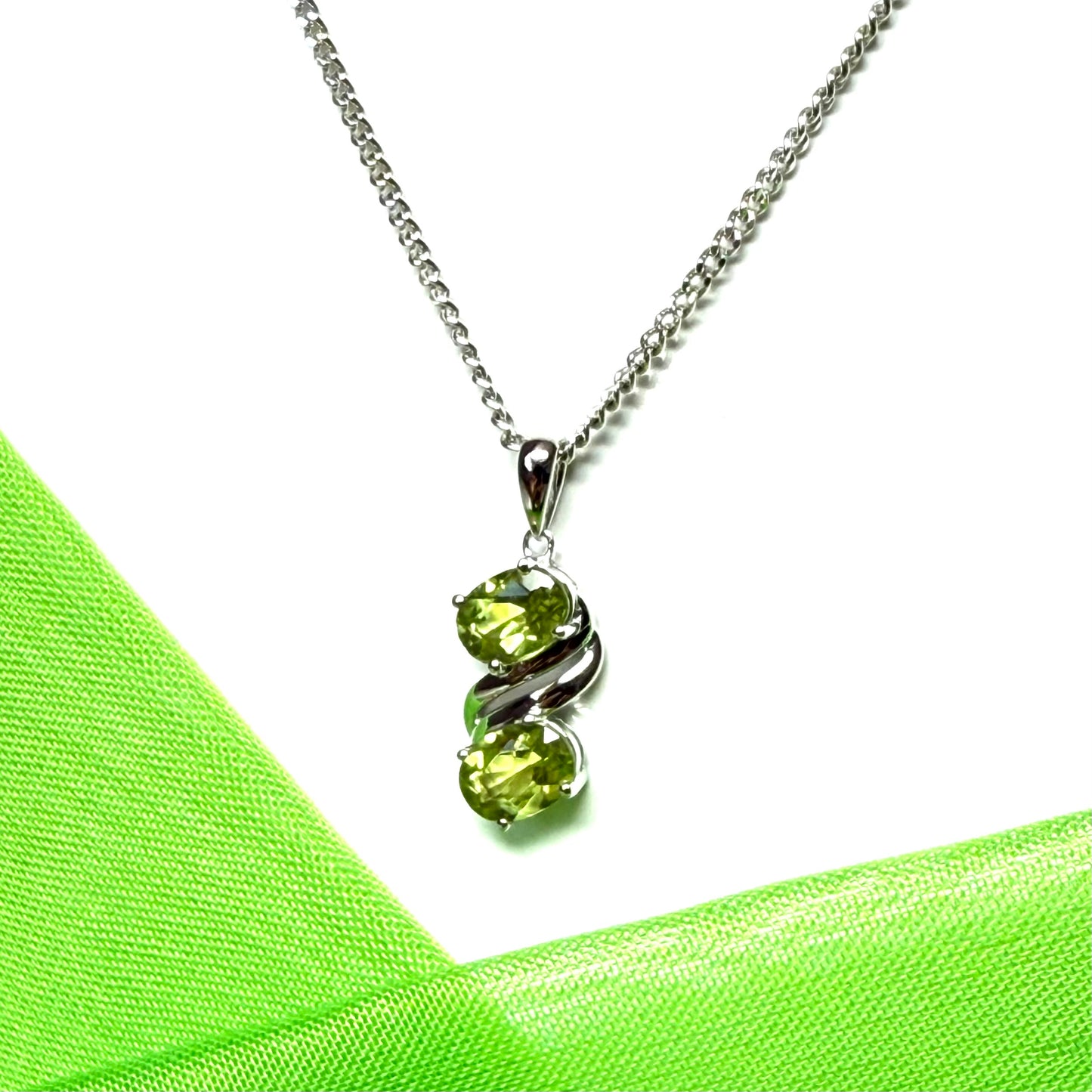 Real green peridot necklace fancy double swirl oval stones including a chain