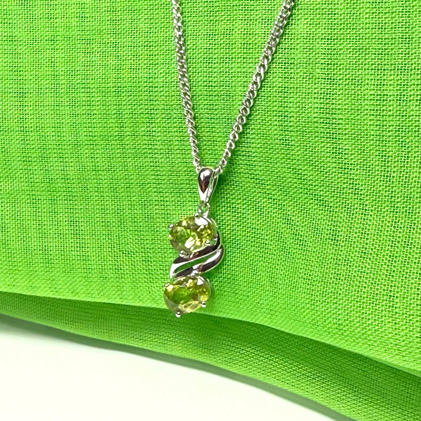 Real green peridot necklace fancy double swirl oval stones including a chain