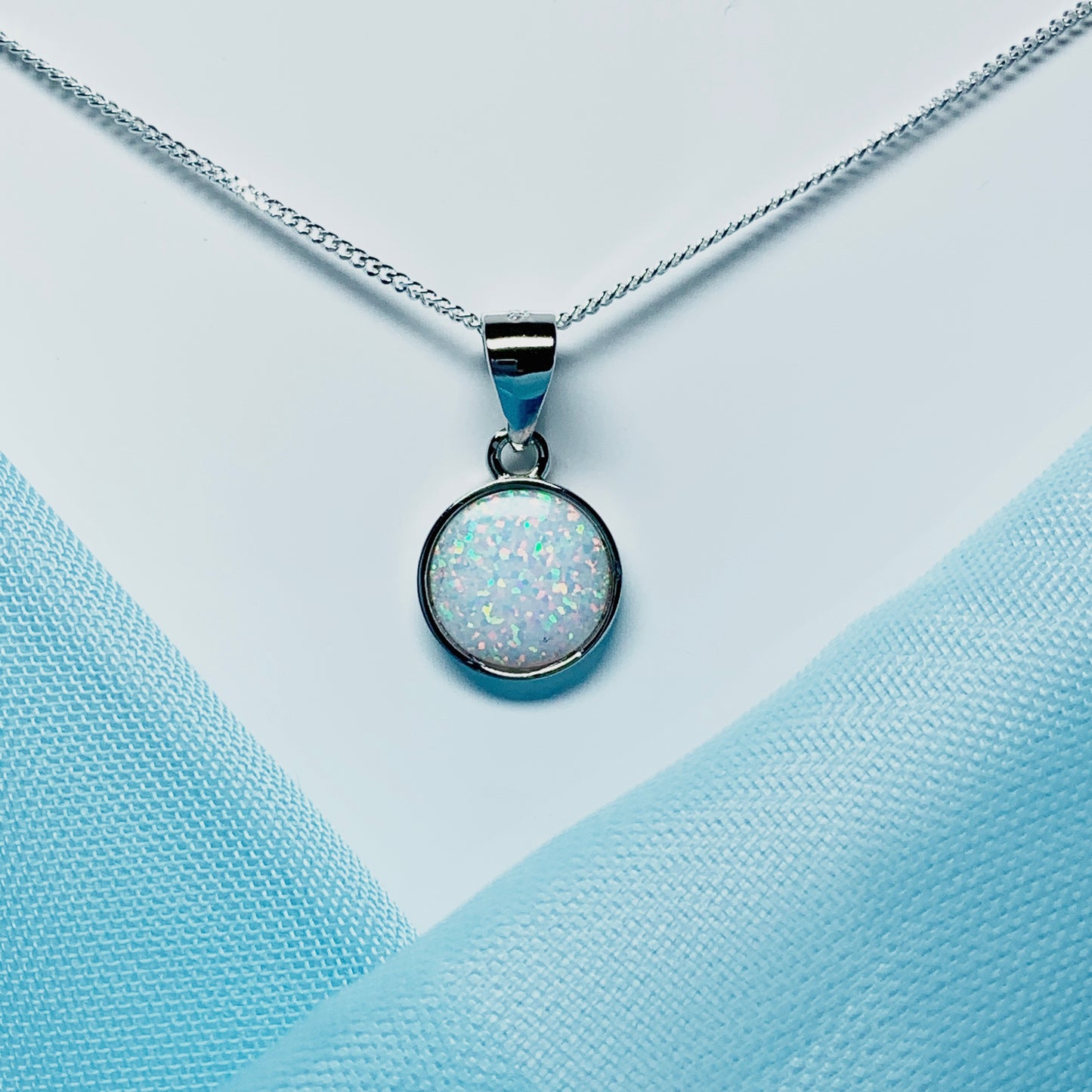 Sterling silver round opal rubbed over necklace