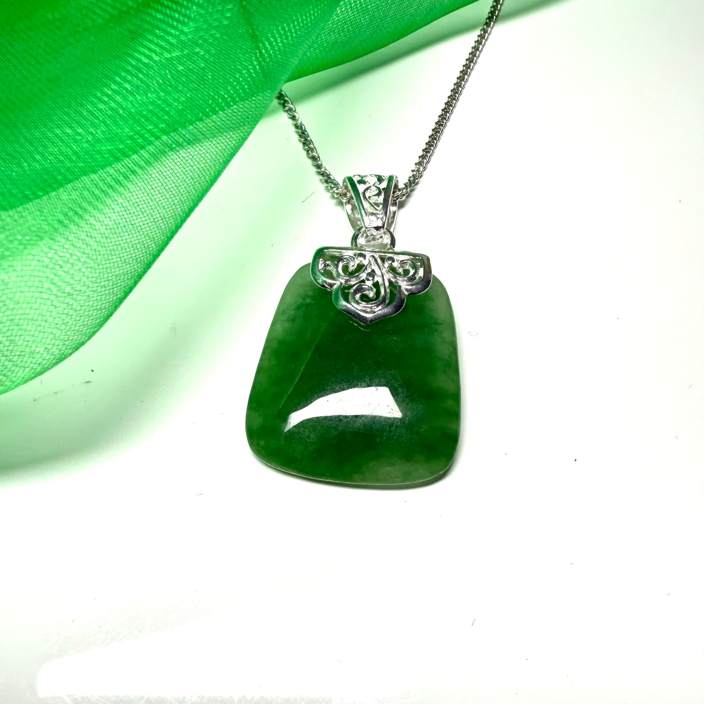 Real green jade necklace large cushion shaped with a solid silver curb chain included sterling silver with a chain