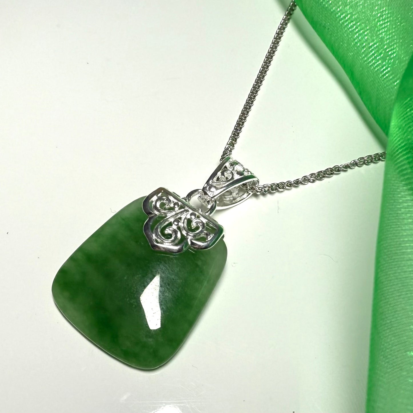 Real green jade necklace large cushion shaped with a solid silver curb chain included sterling silver with a chain
