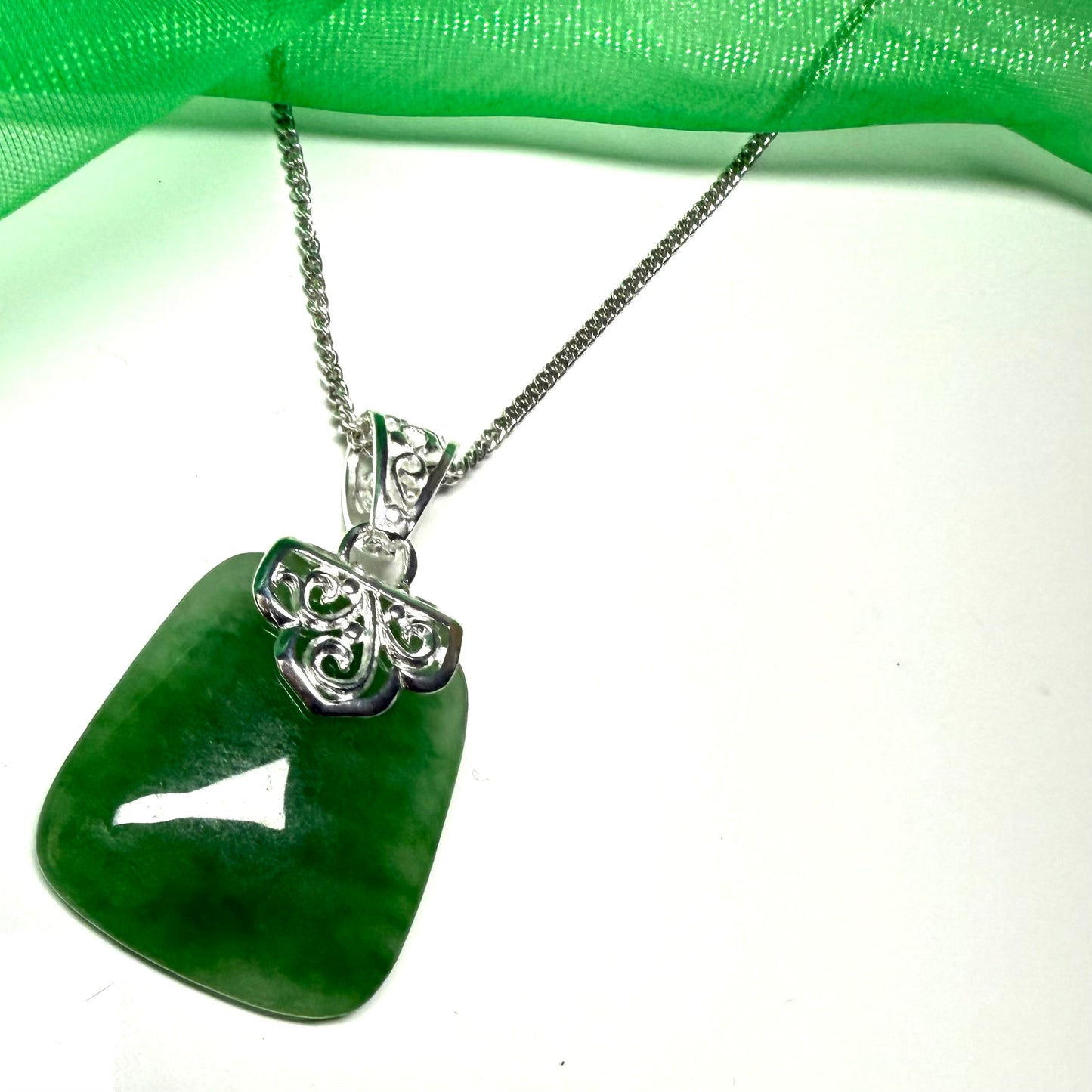 Real green jade necklace large cushion shaped with a solid silver curb chain included sterling silver with a chain